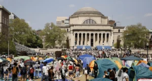 Student protesters gather inside their encampment on the Columbia University campus, April 29, 2024, in New York. (AP Photo/Stefan Jeremiah, File)