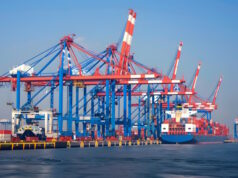 https://www.vecteezy.com/photo/41002122-ai-generated-a-ship-for-transporting-cargo-containers-and-also-unloading-it-at-the-docks-of-a-cargo-port-ai-generated