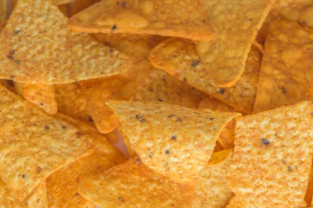 https://www.vecteezy.com/photo/48579072-background-of-corn-tortilla-chips-or-nachos