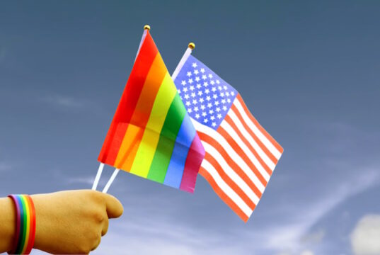 https://www.vecteezy.com/photo/51170590-cut-out-of-hand-holding-both-the-lgbt-flag-and-the-american-flag-set-against-blue-sky-background-with-clipping-paths-the-symbolizing-unity-diversity-and-inclusion