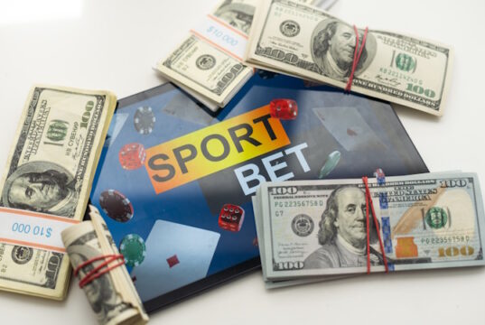 Sports betting https://www.vecteezy.com/photo/45740316-tablet-pc-with-app-for-sport-bets-on-top-of-stacks-of-banknotes-white-background-concept-of-online-bets-3d-render