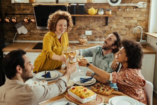 https://www.freepik.com/free-photo/group-happy-young-adults-toasting-having-fun-while-having-lunch-together-dining-room_25777277.htm#fromView=search&page=1&position=5&uuid=b2bed51d-6def-4265-ba5e-5e127237c6e7&query=family+dinner