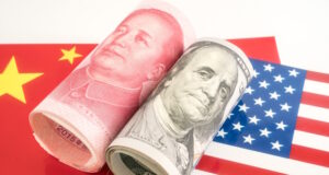 https://www.vecteezy.com/photo/54639967-dollar-and-yuan-currency-lying-on-the-flags-of-usa-and-china