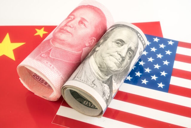 https://www.vecteezy.com/photo/54639967-dollar-and-yuan-currency-lying-on-the-flags-of-usa-and-china