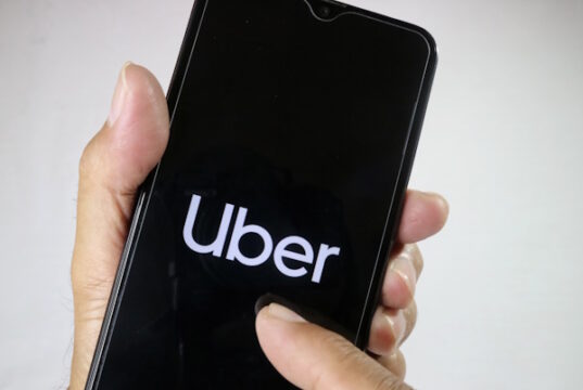 https://www.vecteezy.com/photo/25165585-jakarta-indonesia-2023-hand-holding-mobile-phone-with-finger-touch-the-uber-logo-on-screen