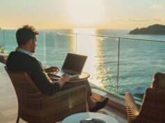 https://www.vecteezy.com/photo/44636902-man-working-on-laptop-on-a-sea-view-balcony-during-golden-hour-symbolizing-remote-work-and-work-life-balance-possibly-near-the-mediterranean