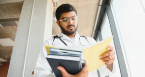https://www.vecteezy.com/photo/49770724-portrait-of-a-young-indian-doctor-student-studying