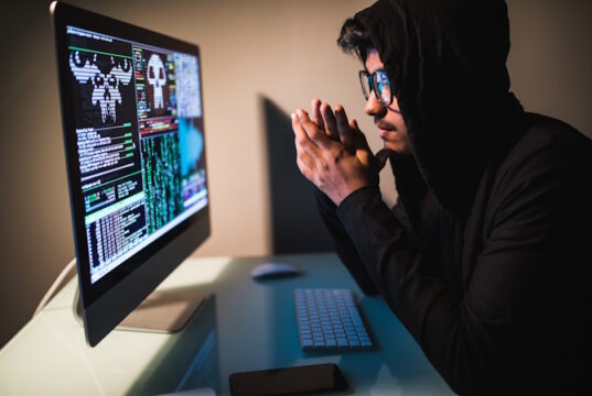 https://www.freepik.com/free-photo/indianmale-hacker-with-smartphone-coding-computers-screen-dark-room_9314239.htm#fromView=search&page=1&position=33&uuid=dc54fb8f-1b06-4bb8-9973-a620ddbc1eba&query=Cybersecurity+Scam