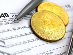 https://www.vecteezy.com/photo/12297226-the-pen-bitcoins-and-dollar-bills-is-lies-on-the-tax-form-1040-u-s-individual-income-tax-return-the-time-to-pay-taxes