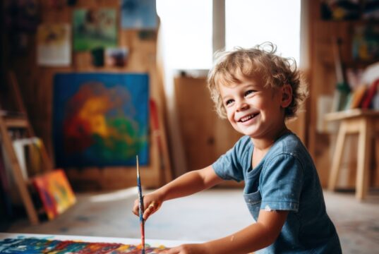 https://www.vecteezy.com/photo/30563531-boy-painting-a-rainbow-on-a-canvas