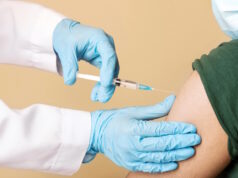 https://www.vecteezy.com/photo/55876286-nurse-making-intramuscualr-injection-against-coronavirus-for-arab-man-at-clinic-patient-wearing-protective-face-mask-closeup-doc-with-syringe-vaccinating-indian-young-guy-while-covid-19-pandemic