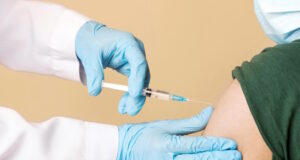 https://www.vecteezy.com/photo/55876286-nurse-making-intramuscualr-injection-against-coronavirus-for-arab-man-at-clinic-patient-wearing-protective-face-mask-closeup-doc-with-syringe-vaccinating-indian-young-guy-while-covid-19-pandemic