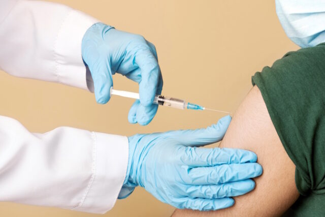 vecteezy_nurse-making-intramuscualr-injection-against-coronavirus-for_55876286 https://www.vecteezy.com/photo/55876286-nurse-making-intramuscualr-injection-against-coronavirus-for-arab-man-at-clinic-patient-wearing-protective-face-mask-closeup-doc-with-syringe-vaccinating-indian-young-guy-while-covid-19-pandemic