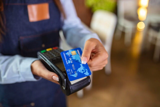 https://www.freepik.com/free-photo/contactless-payment-concept-female-holding-credit-card-near-nfc-technology-counter-client-make-transaction-pay-bill-terminal-rfid-cashier-machine-restaurant-store-close-up-view_27157830.htm#fromView=search&page=1&position=10&uuid=c54f04dd-355b-4f03-be49-a683b12e3a22&query=debit+card