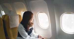 https://www.vecteezy.com/photo/10508704-asian-woman-sitting-in-a-seat-in-airplane-and-looking-out-the-window-going-on-a-trip-asian-woman-passenger-is-leaving-for-a-trip-by-plane-on-vacation-vacation-travel-concept