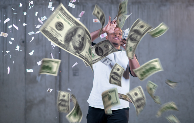 black businessman making the rain of money https://www.vecteezy.com/photo/12445519-black-businessman-making-the-rain-of-money