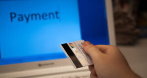https://www.vecteezy.com/photo/49810721-credit-card-in-hand-when-you-pay