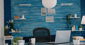 https://www.vecteezy.com/photo/49381143-empty-home-office-with-computer-in-a-beautiful-spacious-living-room-interior-with-blue-furniture-and-walls-workplace-with-nobody-in-it-place-of-work-workspace-concept-pretty-simple-modern-decor