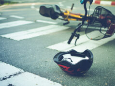 https://www.vecteezy.com/photo/7183138-helmet-and-bike-lying-on-the-road-on-a-pedestrian-crossing-after-accident