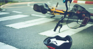 https://www.vecteezy.com/photo/7183138-helmet-and-bike-lying-on-the-road-on-a-pedestrian-crossing-after-accident