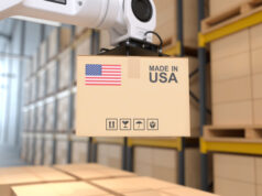 https://www.vecteezy.com/photo/6024517-the-robot-arm-picks-up-the-cardboard-box-made-in-usa-automation-robot-arm-in-the-storehouse