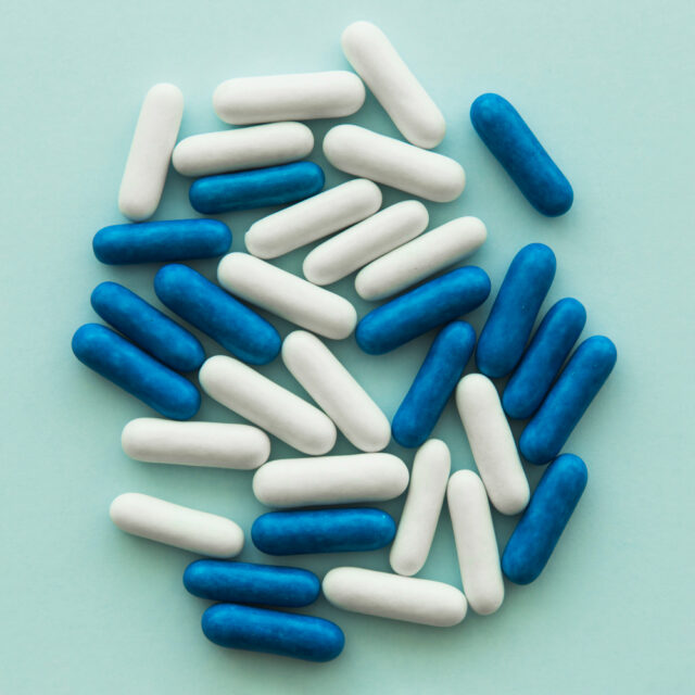 https://www.freepik.com/free-photo/overhead-view-blue-white-oval-candies-colored-background_2816535.htm#fromView=search&page=1&position=20&uuid=bf02a55f-428d-44ff-a59c-cd4bf2ce8a91&query=Gabapentin