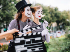 https://www.freepik.com/free-photo/close-up-hand-holding-clapperboard-front-mime-couple_2955177.htm#fromView=search&page=1&position=38&uuid=de6d0d55-f871-4cb7-a2ba-bdc1efbeb7c4&query=movie+actors
