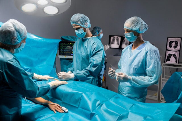 2148962517 https://www.freepik.com/free-photo/surgical-procedure-made-by-doctor-special-equipment_14008917.htm#fromView=search&page=1&position=9&uuid=8ed714dd-789a-4b4a-81ad-6a4d141db6a9&query=hospital+or