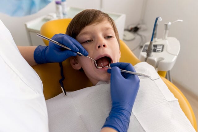https://www.freepik.com/free-photo/dentist-cleaning-child-s-teeth_20823066.htm#fromView=search&page=1&position=4&uuid=bb4102a1-1b0a-4a20-804f-0d796e29d1c9&query=kid+at+dentist
