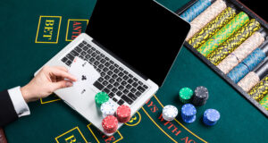 https://www.vecteezy.com/photo/35180523-casino-online-gambling-technology-and-people-concept-close-up-of-poker-player-with-playing-cards