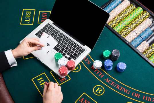 https://www.vecteezy.com/photo/35180523-casino-online-gambling-technology-and-people-concept-close-up-of-poker-player-with-playing-cards