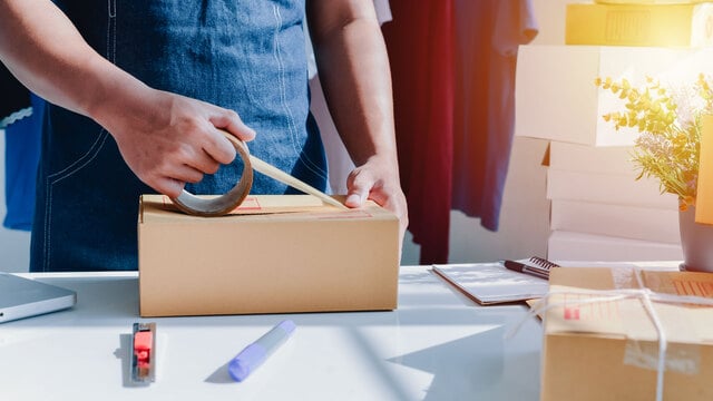 Closeup view of man online store small business owner seller ent https://www.vecteezy.com/photo/2595935-close-up-view-of-man-s-online-store-small-business-owner-seller-entrepreneur-packing-package-post-shipping-box-preparing-delivery-parcel-on-the-table-entrepreneurial-self-employed-business-concept