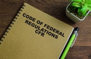 https://www.vecteezy.com/photo/39949787-concept-of-code-of-federal-regulations-cfr-write-on-book-isolated-on-wooden-table