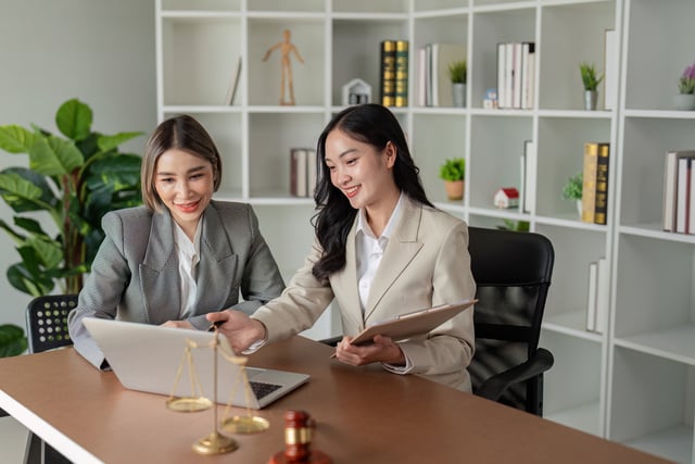 https://www.vecteezy.com/photo/49754224-female-lawyers-reviewing-case-details-on-laptop-together
