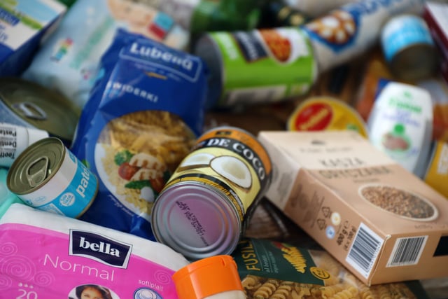 KYIV, UKRAINE - 4 MAY, 2023: Big stack of humanitarian aid food and products from europe to ukrainian refugees https://www.vecteezy.com/photo/46536232-kyiv-ukraine-4-may-2023-big-stack-of-humanitarian-aid-food-and-products-from-europe-to-ukrainian-refugees