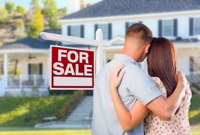 Military Couple Looking At House with For Sale Real Estate Sign In Front. https://www.vecteezy.com/photo/16444313-military-couple-looking-at-house-with-for-sale-real-estate-sign-in-front