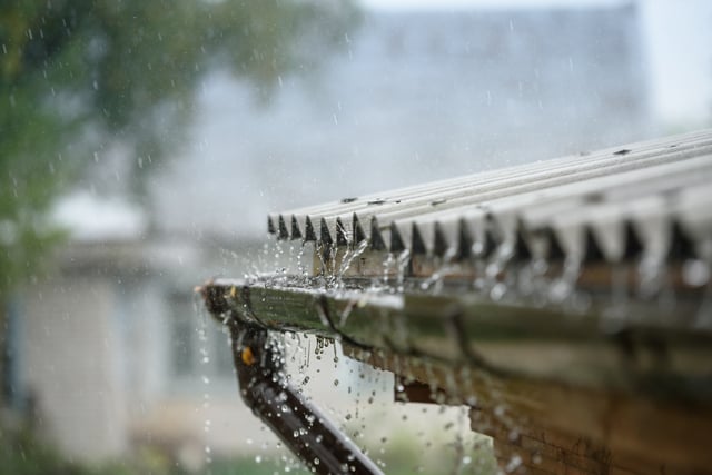 rain flows down from a roof down https://www.vecteezy.com/photo/26305148-rain-flows-down-from-a-roof-down