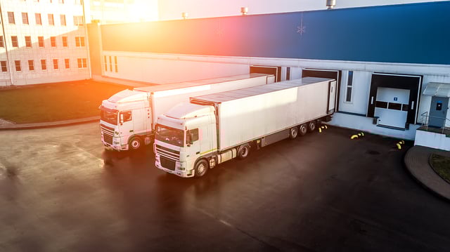trucks are loaded in a modern logistics center https://www.vecteezy.com/photo/5740803-trucks-are-loaded-in-a-modern-logistics-center