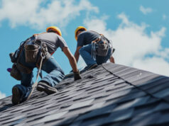 https://www.vecteezy.com/photo/44649926-with-safety-harnesses-and-professional-equipment-a-team-of-roofers-diligently-works-to-fix-a-damaged-section-of-a-roof-preventing-any-further-leaks-or-water-damage
