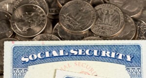 https://www.freepik.com/premium-photo/usa-social-security-cards-laid-quarter-coins_26699388.htm#from_element=cross_selling__photo