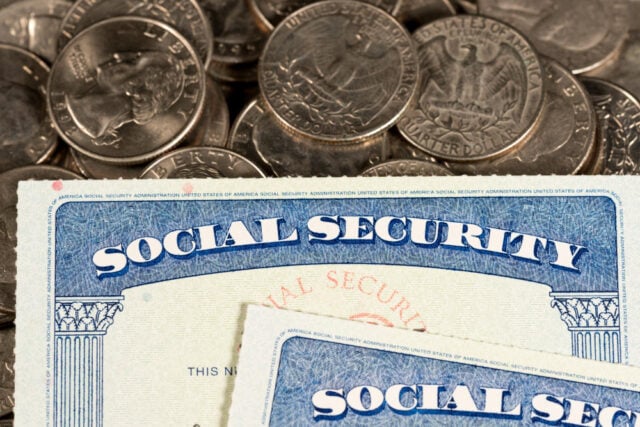 2276 https://www.freepik.com/premium-photo/usa-social-security-cards-laid-quarter-coins_26699388.htm#from_element=cross_selling__photo