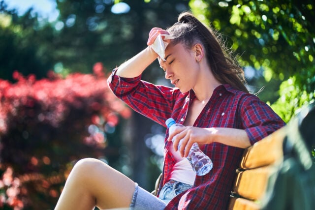 3233 https://www.freepik.com/premium-photo/woman-sweating-hot-weather_8751600.htm#fromView=search&page=1&position=5&uuid=e3f6ce6d-779f-49f5-bd4e-57d270af633c&query=hot+weather