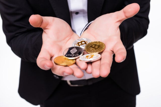 4023 https://www.freepik.com/free-photo/man-holds-different-crypto-coins-his-hands-white_9695278.htm#fromView=search&page=1&position=6&uuid=4a2da6c4-8f53-40eb-95d7-db7e8389648a&query=person+stacking+crypto