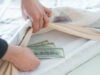 https://www.freepik.com/premium-photo/hand-taking-hidden-stash-cash-money-from-wardrobe-home_19161339.htm#fromView=search&page=1&position=19&uuid=a04e9a4d-5c5e-4f26-9da1-02defbd6c8b7&query=money+under+mattress