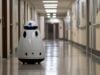 https://www.vecteezy.com/photo/56043700-a-robot-walking-down-a-hallway