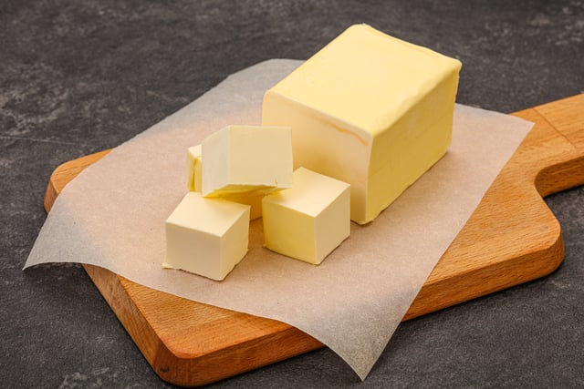 Dairy natural yellow butter piece https://www.vecteezy.com/photo/7701458-dairy-natural-yellow-butter-piece