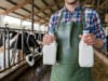 https://www.vecteezy.com/photo/54898192-dairy-worker-holding-milk-bottles-in-rustic-barn