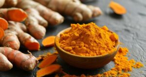 https://www.vecteezy.com/photo/47331438-fresh-turmeric-and-powder-on-dark-background