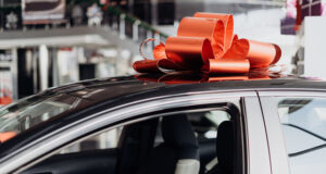 https://www.vecteezy.com/photo/3114948-the-new-car-is-wrapped-in-a-red-bow-beautiful-gift-concept