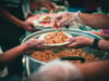 https://www.vecteezy.com/photo/44426704-volunteer-serving-food-to-the-homeless-in-the-community-charitable-donation-center-concept-of-free-food-assistance-service